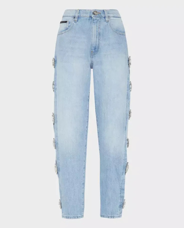 Jasnoniebieskie jeansy z wycięciami