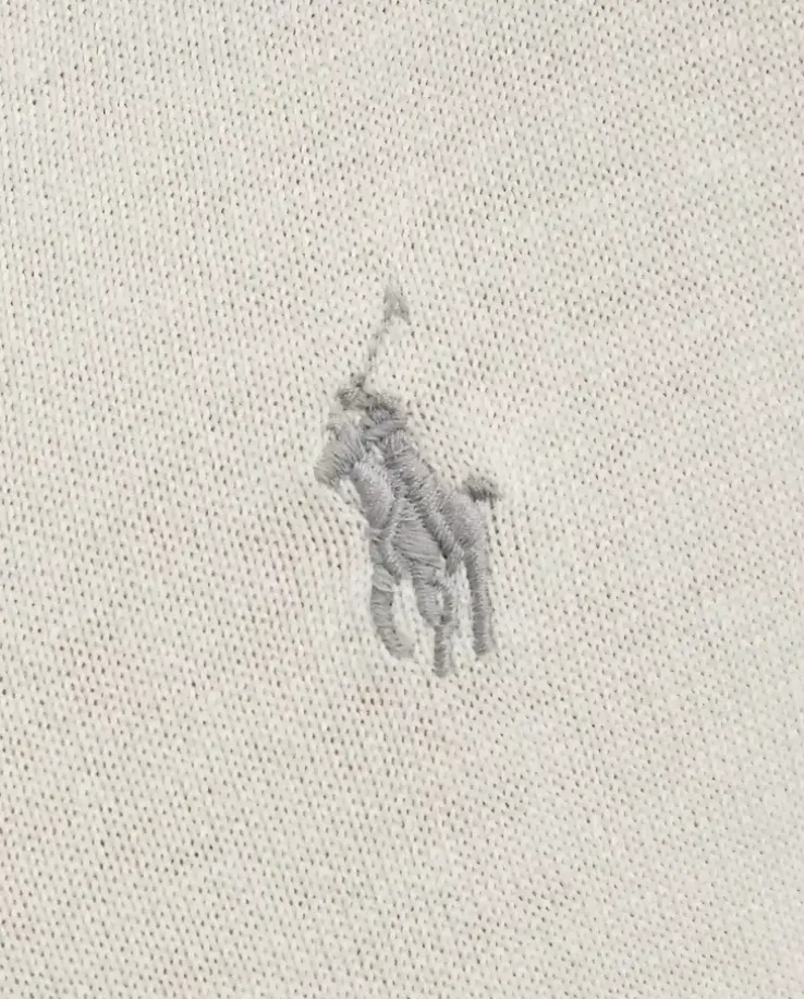 Kremowy sweter z haftowanym logo